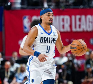 Ryan Nembhard dribbles up court for the Dallas Mavericks with Morez Johnson Jr. trailing during 2026 NBA Summer League.