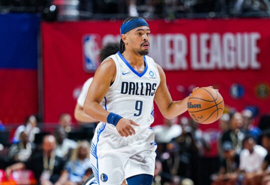 Ryan Nembhard dribbles up court for the Dallas Mavericks with Morez Johnson Jr. trailing during 2026 NBA Summer League.