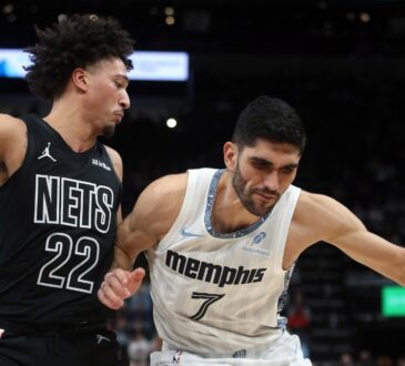 Memphis Grizzlies forward Santi Aldama drives to the basket against Brooklyn Nets forward Jalen Wilson during a game at FedExForum
