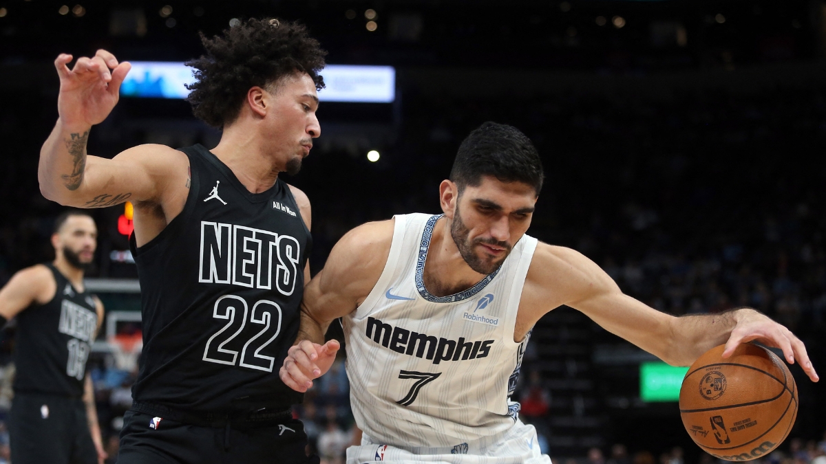 Memphis Grizzlies forward Santi Aldama drives to the basket against Brooklyn Nets forward Jalen Wilson during a game at FedExForum