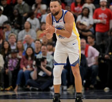 Golden State Warriors guard Stephen Curry #30 celebrates on the court against the Los Angeles Clippers during the 2026 NBA Play-In Tournament at Intuit Dome.