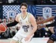 Tarik Biberović drives to the basket for Fenerbahçe Beko against an Anadolu Efes defender