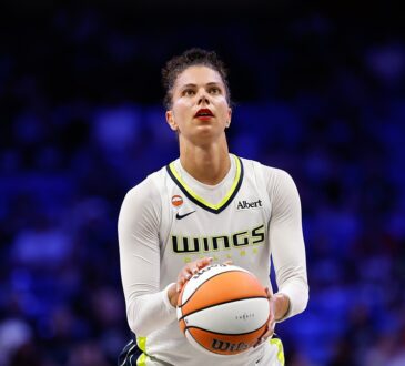 Dallas Wings forward Alysha Clark lines up a free throw with her eyes on the rim.