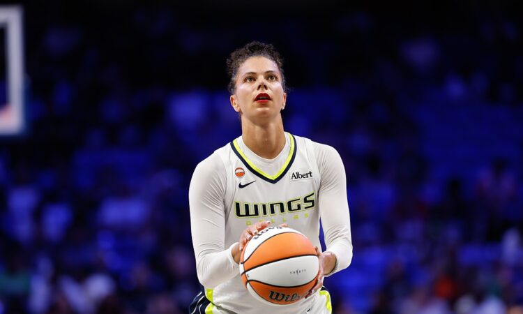 Dallas Wings forward Alysha Clark lines up a free throw with her eyes on the rim.