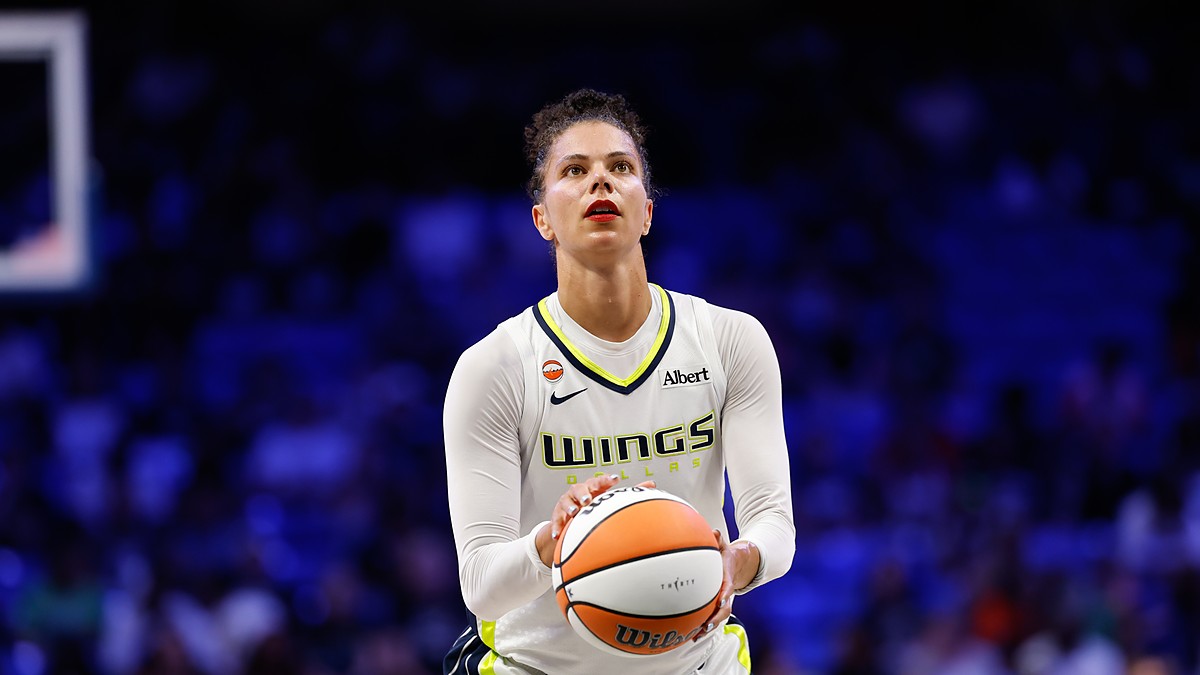 Dallas Wings forward Alysha Clark lines up a free throw with her eyes on the rim.