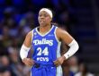 Dallas Wings guard Arike Ogunbowale stands with her hands on her hips during a stoppage against the Las Vegas Aces.