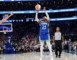 Alt Text: Dallas Wings guard Arike Ogunbowale rises for a jump shot as Indiana Fever guard Lexie Hull closes out.
