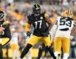 Pittsburgh Steelers offensive tackle Broderick Jones sets to block Green Bay Packers defensive end Arron Mosby.