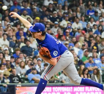 Texas Rangers starting pitcher Cal Quantrill follows through on a pitch against the Milwaukee Brewers.