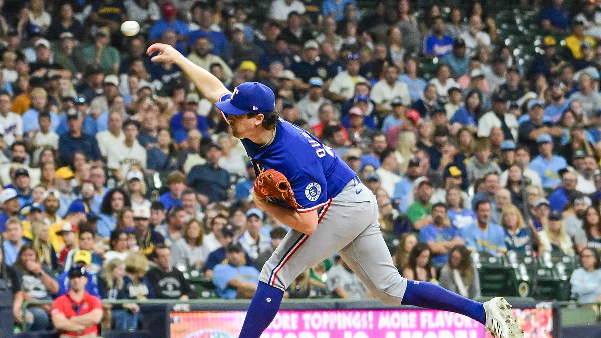Texas Rangers starting pitcher Cal Quantrill follows through on a pitch against the Milwaukee Brewers.