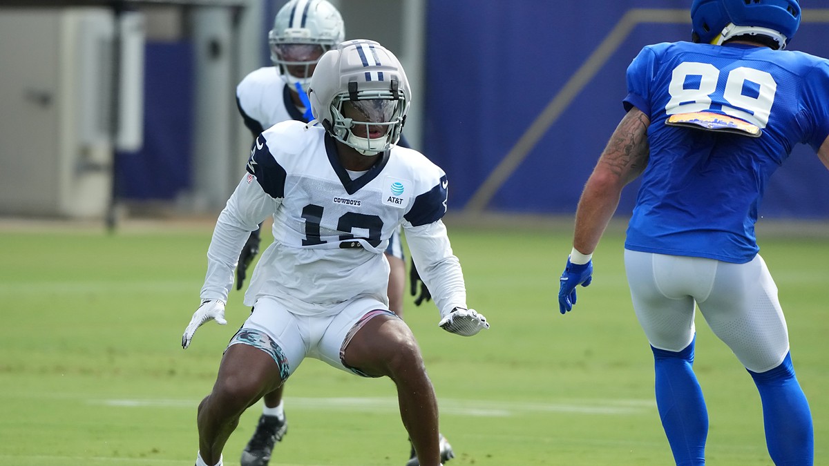 Dallas Cowboys safety Caleb Downs drops into coverage against Los Angeles Rams tight end Tyler Higbee at a joint practice.