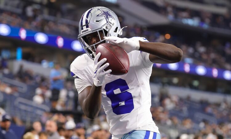 Dallas Cowboys wide receiver Camden Brown pulls in a pass during pregame warmups.