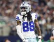 Dallas Cowboys wide receiver CeeDee Lamb reacts after a catch in his No. 88 jersey at AT&T Stadium.