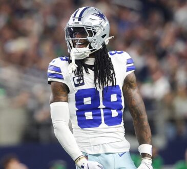 Dallas Cowboys wide receiver CeeDee Lamb reacts after a catch in his No. 88 jersey at AT&T Stadium.