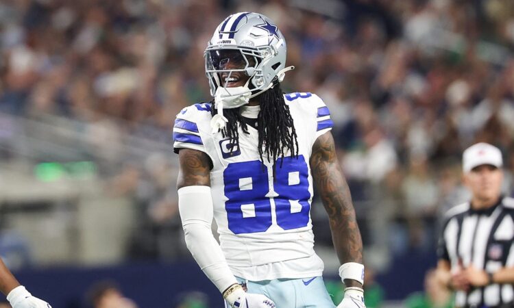 Dallas Cowboys wide receiver CeeDee Lamb reacts after a catch in his No. 88 jersey at AT&T Stadium.