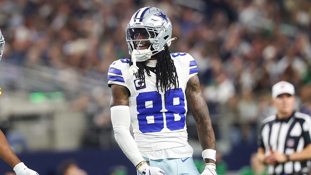 Dallas Cowboys wide receiver CeeDee Lamb reacts after a catch in his No. 88 jersey at AT&T Stadium.