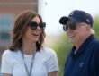 Dallas Cowboys chief brand officer Charlotte Jones laughs alongside owner Jerry Jones at training camp.