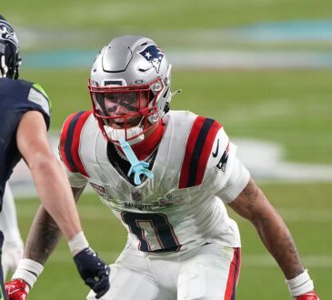 New England Patriots cornerback Christian Gonzalez shadows Seattle Seahawks wide receiver Cooper Kupp at the line.