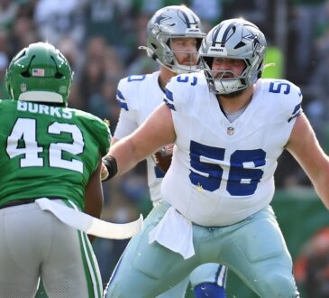 Dallas Cowboys center Cooper Beebe blocks Philadelphia Eagles linebacker Oren Burks in pass protection.