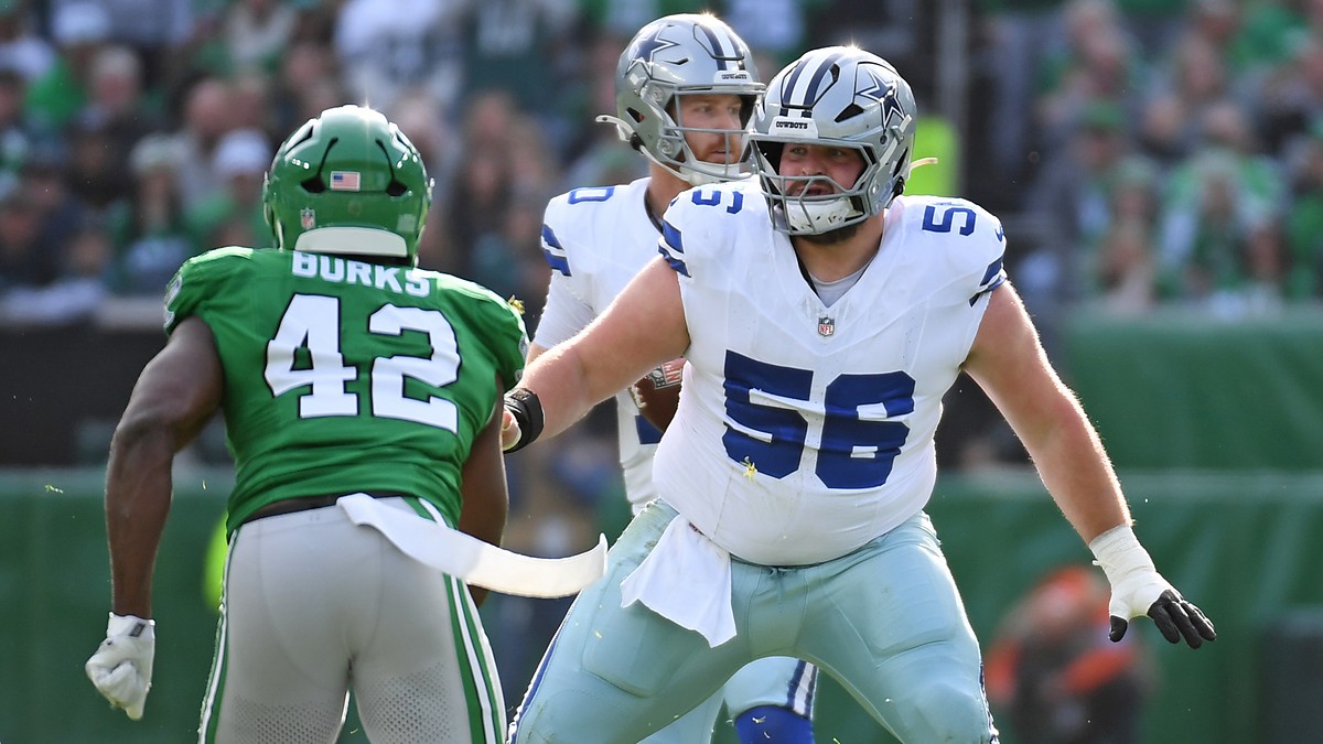 Dallas Cowboys center Cooper Beebe blocks Philadelphia Eagles linebacker Oren Burks in pass protection.