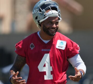 Dallas Cowboys quarterback Dak Prescott #4 takes reps during training camp practice at River Ridge Playing Fields in Oxnard.