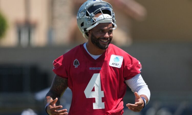 Dallas Cowboys quarterback Dak Prescott #4 takes reps during training camp practice at River Ridge Playing Fields in Oxnard.