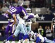Dallas Cowboys linebacker DeMarvion Overshown flips Minnesota Vikings tight end T.J. Hockenson upside down on a tackle.