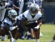 Dallas Cowboys offensive tackle Drew Shelton sets in a stance during a training camp drill.