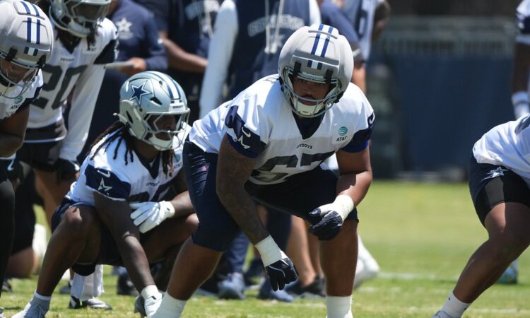 Dallas Cowboys offensive tackle Drew Shelton sets in a stance during a training camp drill.