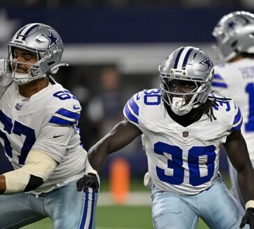 Dallas Cowboys offensive tackle Drew Shelton and running back Israel Abanikanda block in front of the quarterback against the Saints.
