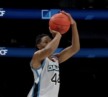 Dallas Power guard Elijah Stewart, in a white No. 44 jersey, elevates and releases a jump shot.