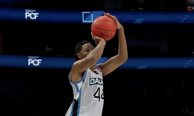 Dallas Power guard Elijah Stewart, in a white No. 44 jersey, elevates and releases a jump shot.
