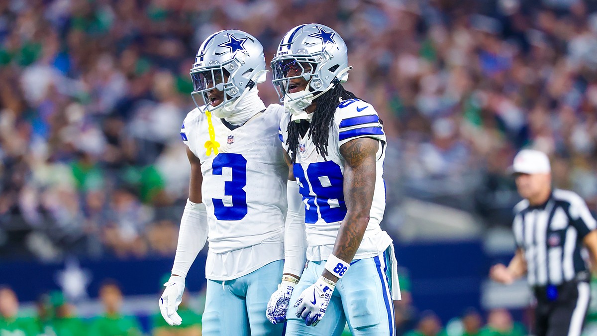 Dallas Cowboys wide receivers George Pickens and CeeDee Lamb stand shoulder to shoulder reacting during a game against the Eagles.
