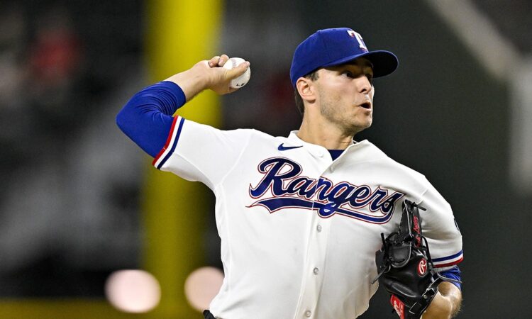 Texas Rangers starting pitcher Jack Leiter cocks his arm to deliver a pitch against the Minnesota Twins.