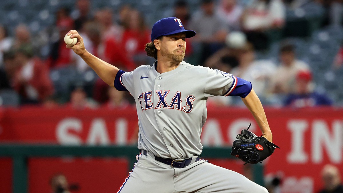Rangers pitcher Jacob deGrom reaches back to deliver a pitch against the Angels