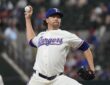Texas Rangers starting pitcher Jacob deGrom releases a pitch in his white home uniform at Globe Life Field.