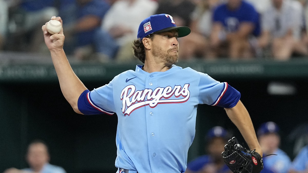 Texas Rangers starting pitcher Jacob deGrom rears back to throw in the powder blue Sunday jersey.