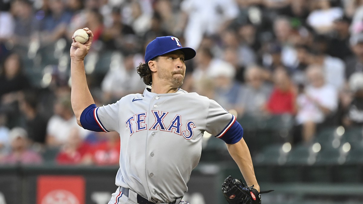 Texas Rangers pitcher Jacob deGrom delivers a pitch in his windup against the Chicago White Sox.