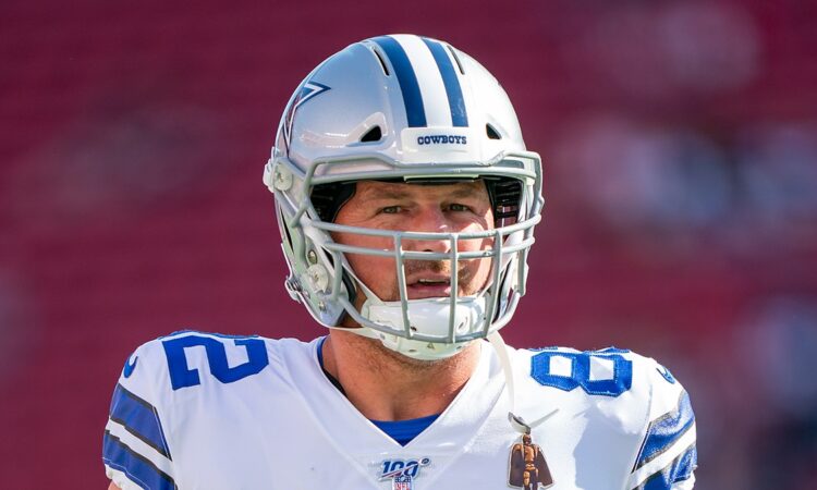 Dallas Cowboys tight end Jason Witten stands in uniform and helmet before a preseason game against the San Francisco 49ers.