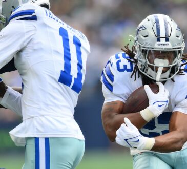 Dallas Cowboys running back Jaydon Blue tucks the ball and cuts upfield against the Seattle Seahawks.