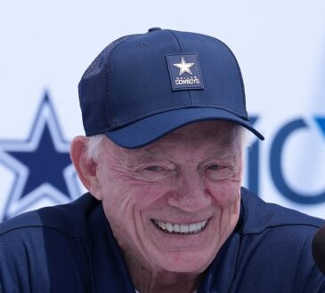 Dallas Cowboys owner and general manager Jerry Jones smiles during the team's training camp opening press conference.