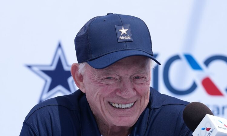 Dallas Cowboys owner and general manager Jerry Jones smiles during the team's training camp opening press conference.