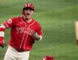 Texas Rangers designated hitter Joc Pederson shouts and flips his bat after connecting on a home run.
