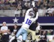 Dallas Cowboys wide receiver Jordan Hudson stretches to make a catch over a New Orleans Saints defender.