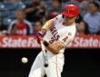 Los Angeles Angels right fielder Josh Lowe drives a pitch into the outfield for a double against the Texas Rangers.