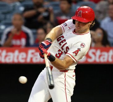 Los Angeles Angels right fielder Josh Lowe drives a pitch into the outfield for a double against the Texas Rangers.