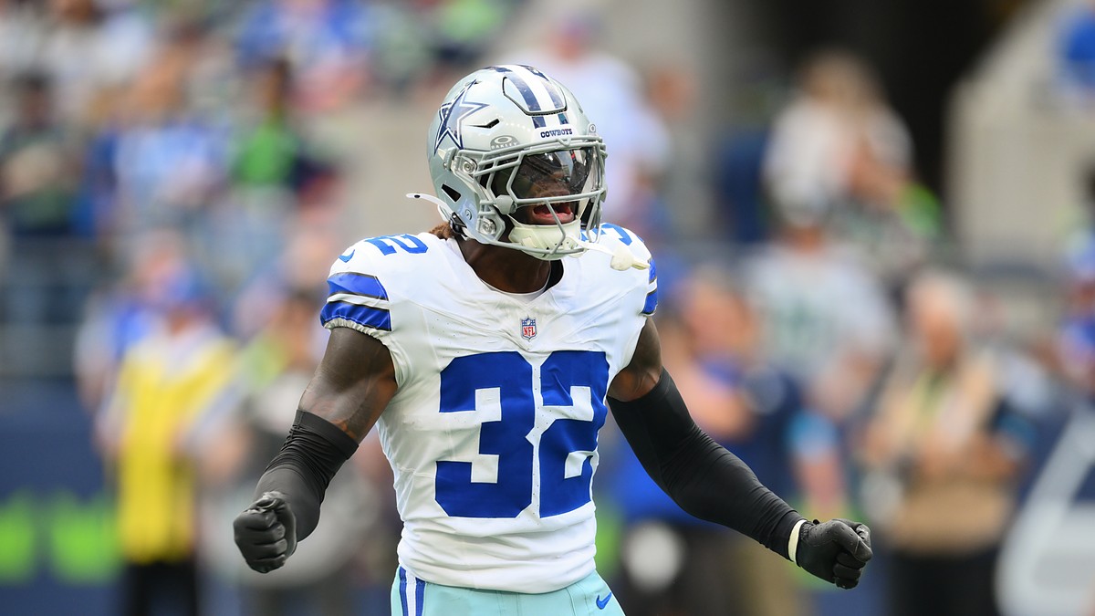 Dallas Cowboys safety Julius Wood shouts in celebration after a special teams play at Lumen Field