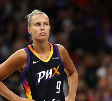 Phoenix Mercury guard Kitija Laksa stands with hands on hips during a game against the Sparks.