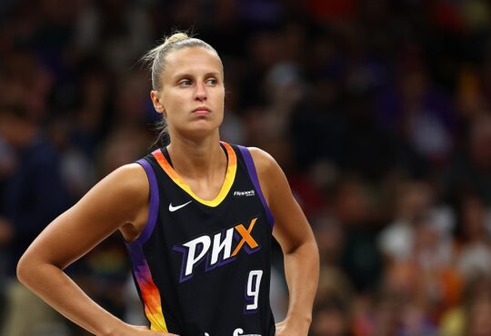 Phoenix Mercury guard Kitija Laksa stands with hands on hips during a game against the Sparks.