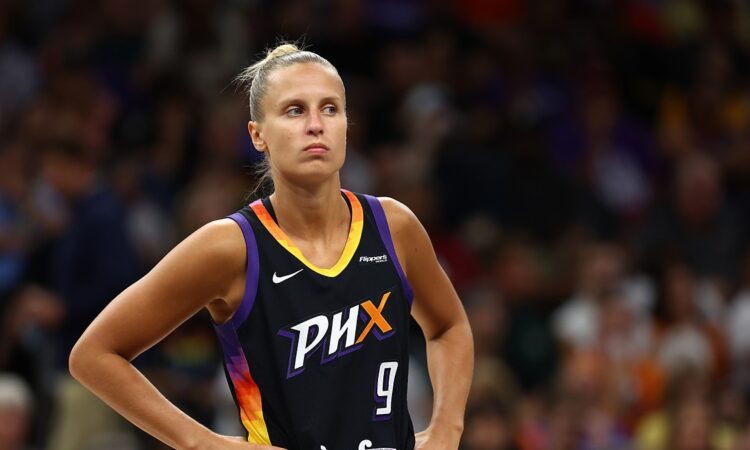 Phoenix Mercury guard Kitija Laksa stands with hands on hips during a game against the Sparks.